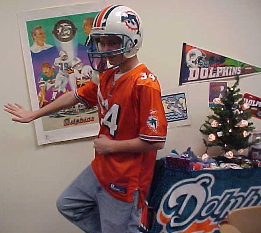 Caleb Peters, a big Dolphins fan, does the Heismann pose on 12-17-07!