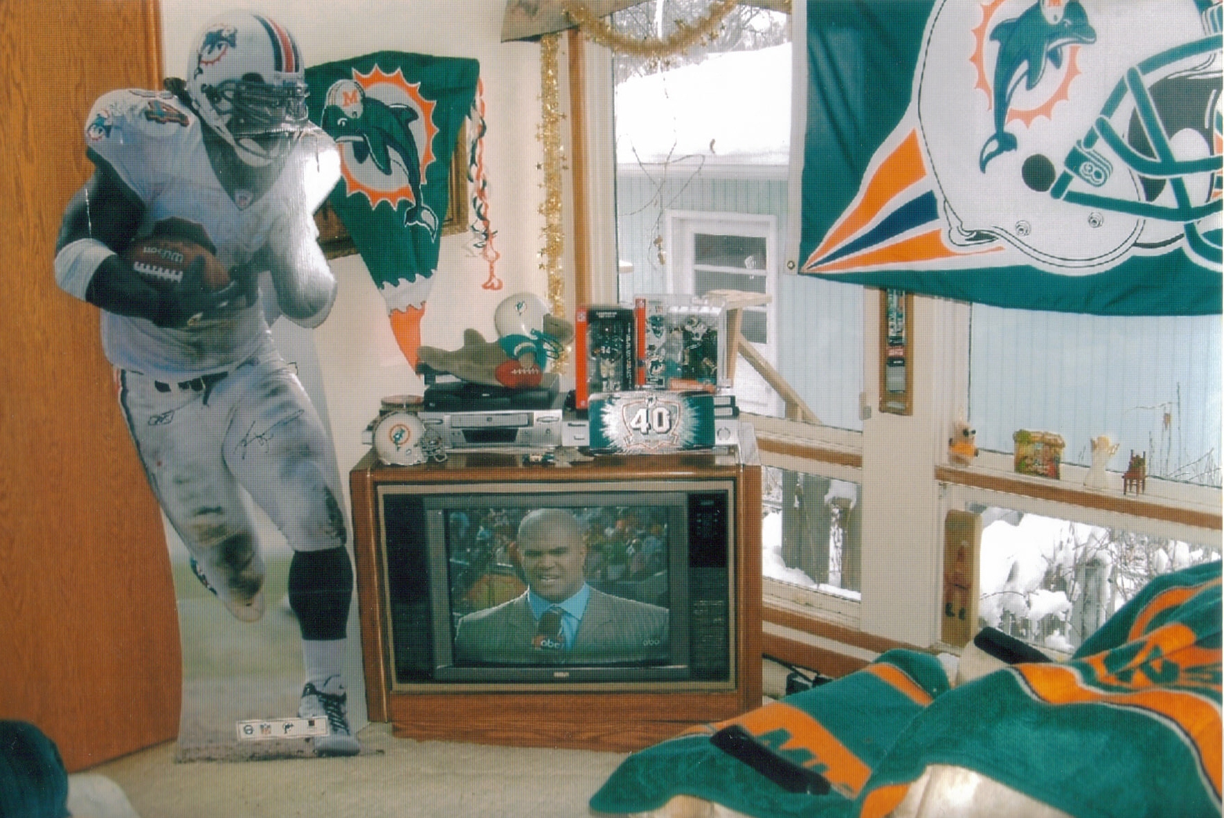 December of 2005: living room set to watch Dolphins