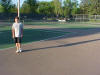 5-26-10 Alex stands on courts before resurfacing