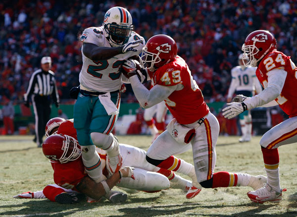 Ronnie runs tough in the coldest game in Dolphin history.